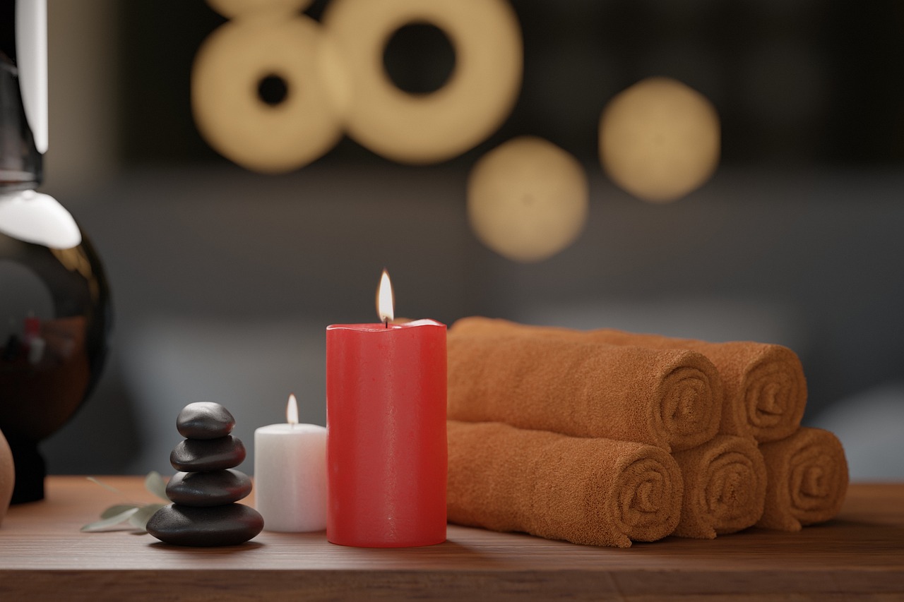 Ambiance de spa avec bougies et serviettes pour une détente optimale